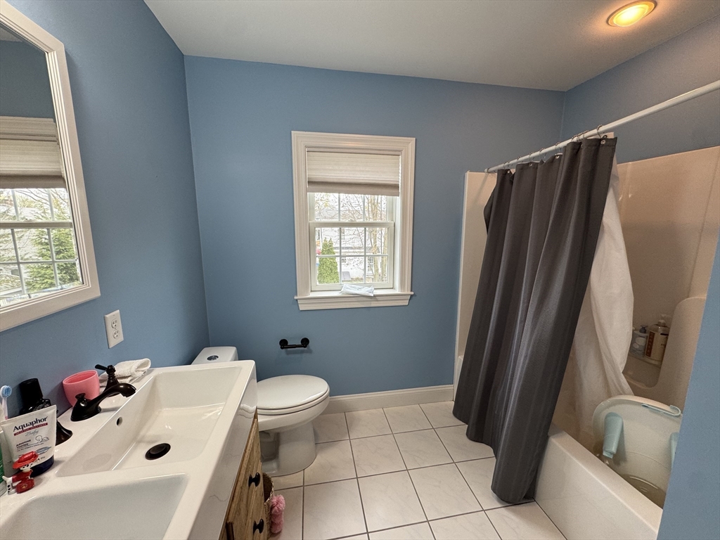 43 Canterbury Road Waltham, MA 02453 - Photo 30 of 42 a bathroom with a sink toilet and shower