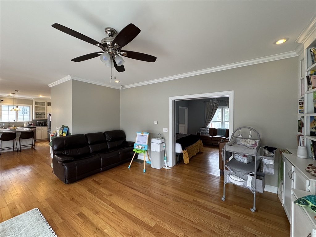 43 Canterbury Road Waltham, MA 02453 - Photo 36 of 42 a living room with furniture and a wooden floor