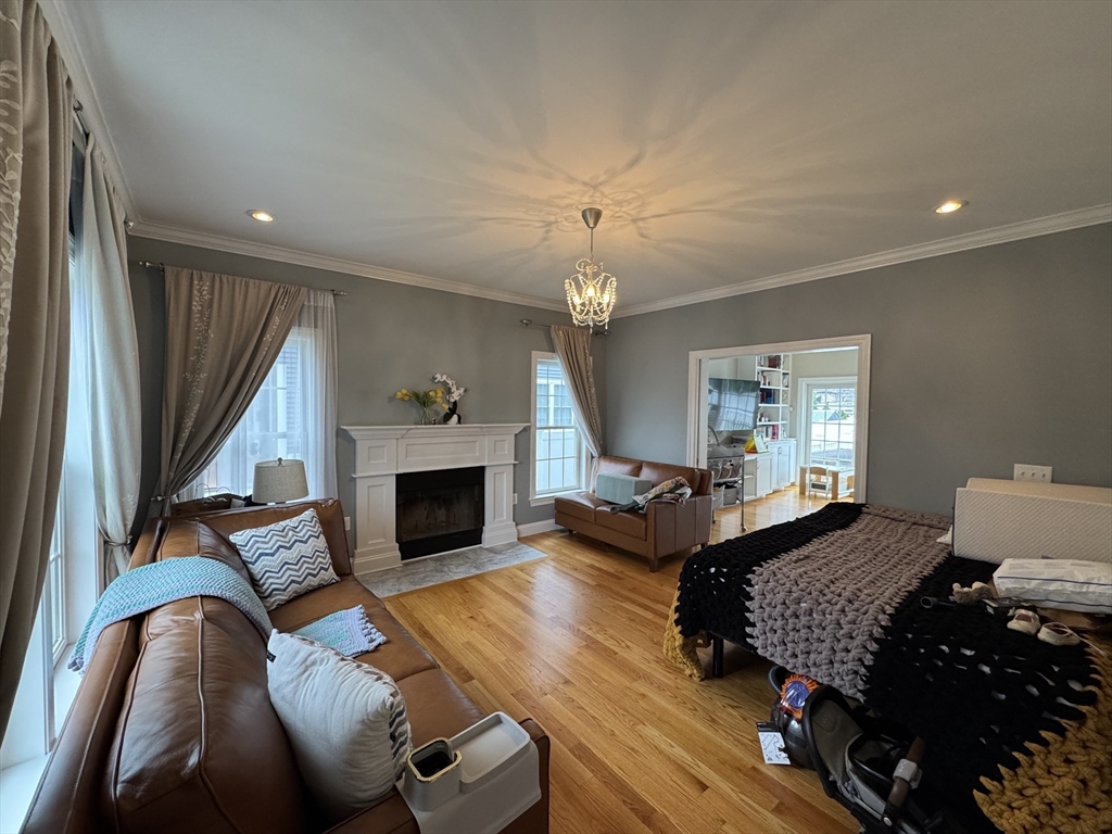 43 Canterbury Road Waltham, MA 02453 - Photo 37 of 42 a living room with furniture fireplace and window