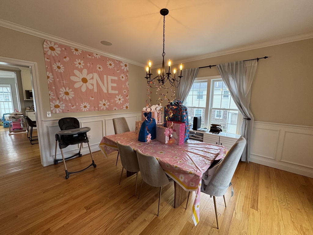 43 Canterbury Road Waltham, MA 02453 - Photo 38 of 42 a view of a dining room with furniture and wooden floor