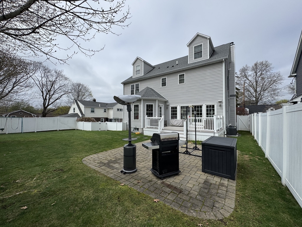 43 Canterbury Road Waltham, MA 02453 - Photo 9 of 42 a view of house with outdoor space and garden