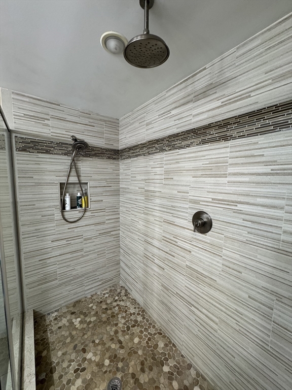 43 Canterbury Road Waltham, MA 02453 - Photo 10 of 42 a bathroom with a shower