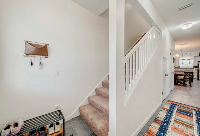 a view of an entryway with stairs