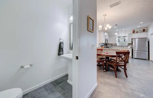 a view of a dining room with furniture
