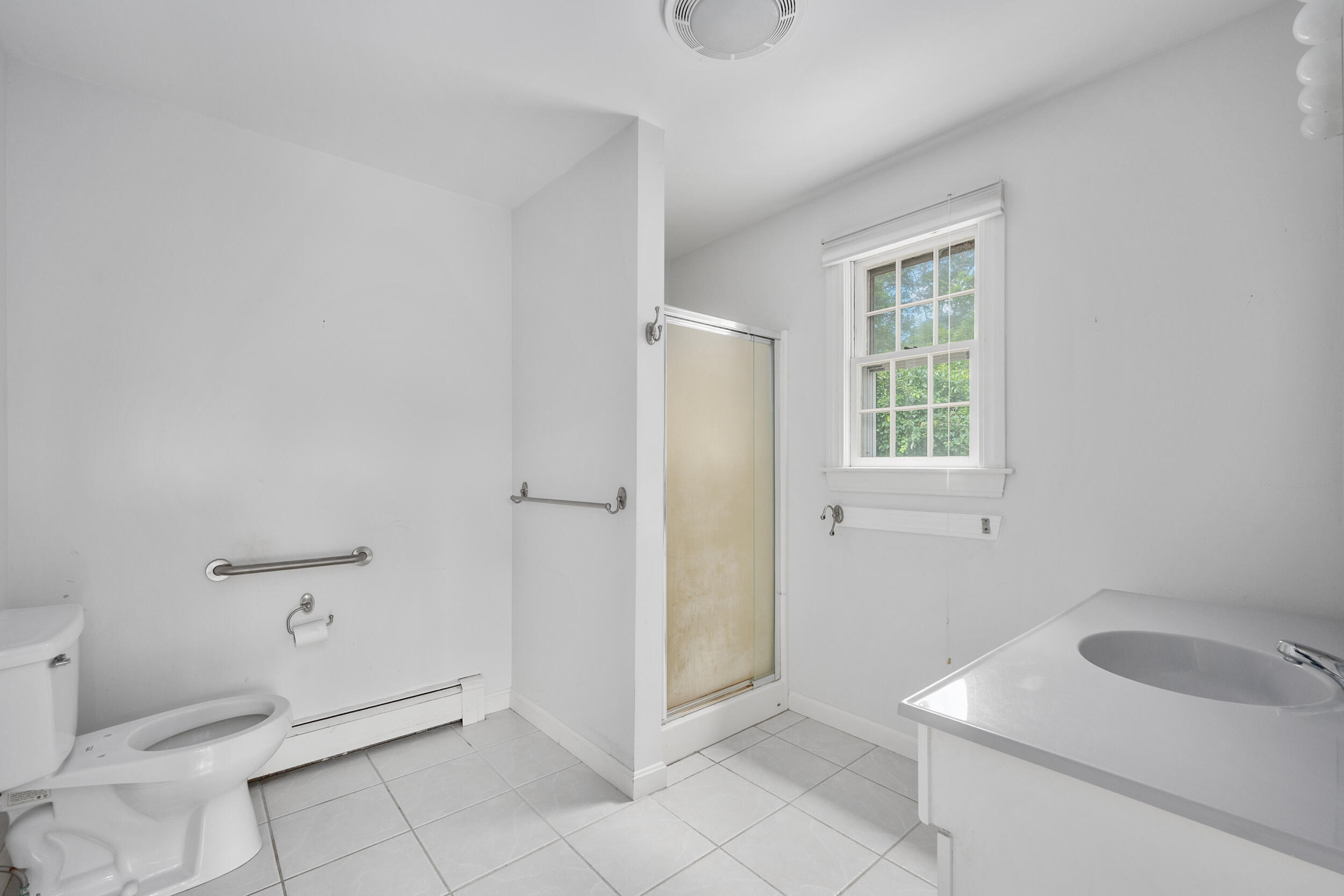 93 Harris Meadow Lane Barnstable, MA 02630 - Photo 26 of 64 a bathroom with a sink toilet and vanity
