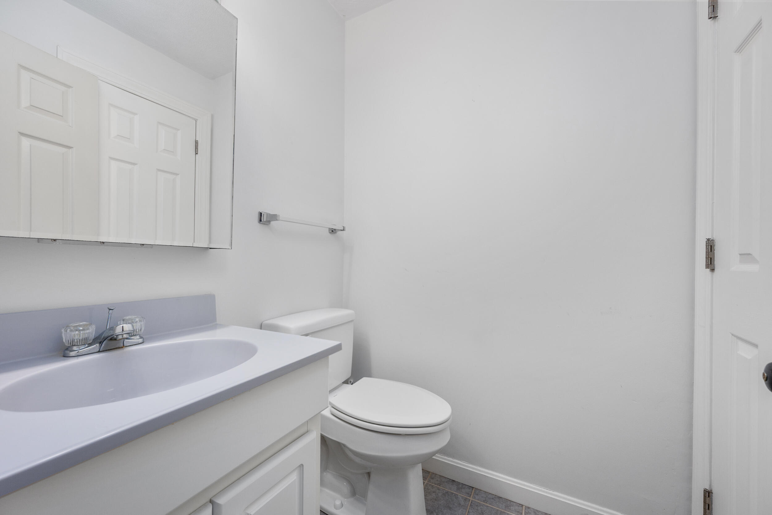 93 Harris Meadow Lane Barnstable, MA 02630 - Photo 29 of 64 a bathroom with a sink a toilet and mirror