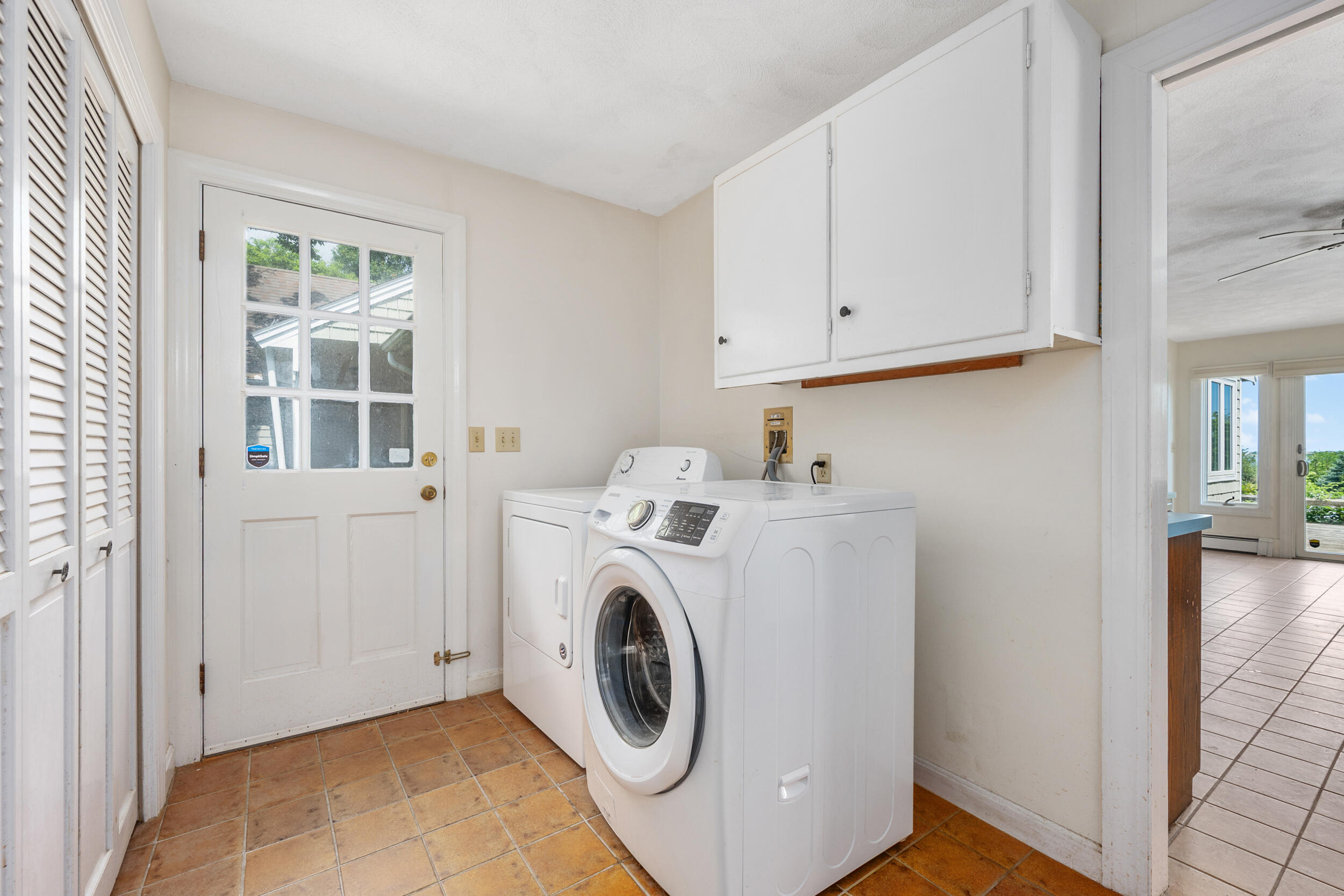 93 Harris Meadow Lane Barnstable, MA 02630 - Photo 30 of 64 a utility room with dryer and washer
