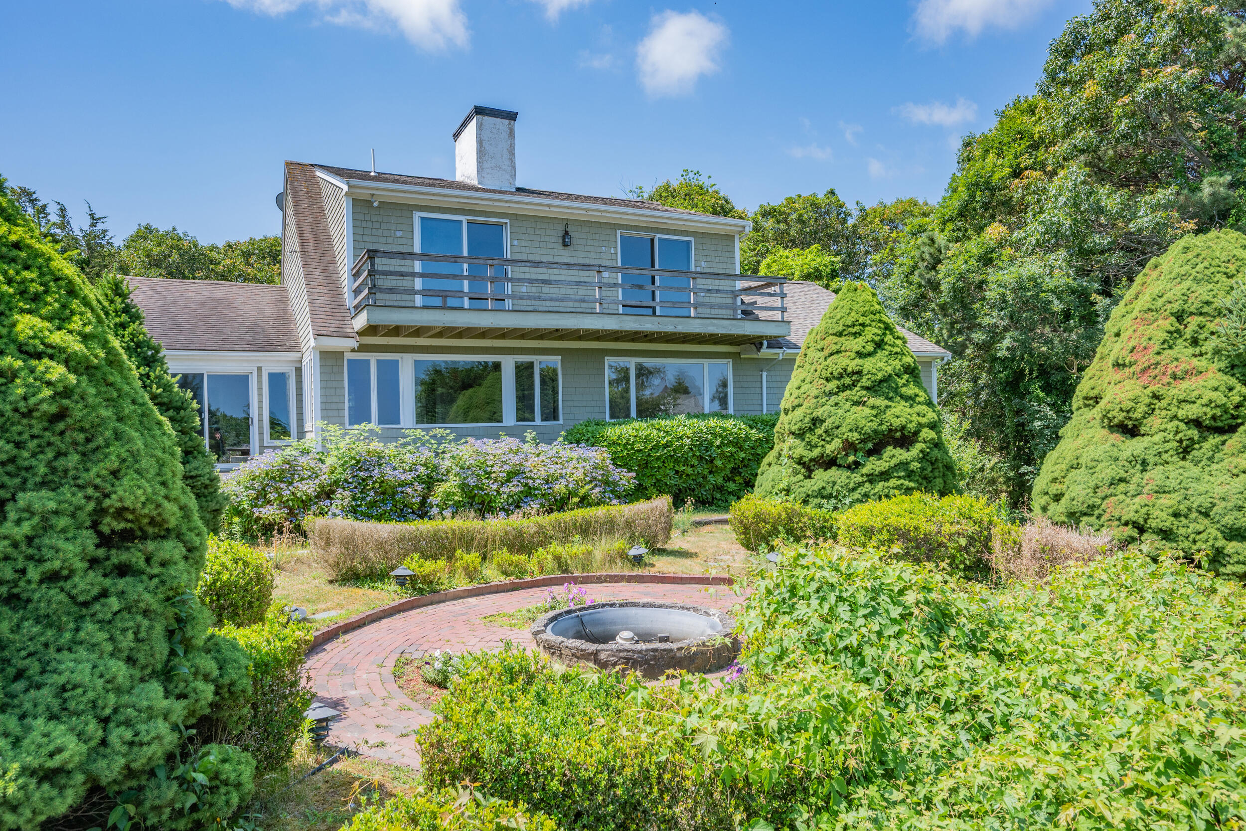 93 Harris Meadow Lane Barnstable, MA 02630 - Photo 6 of 64 a front view of a house with a yard