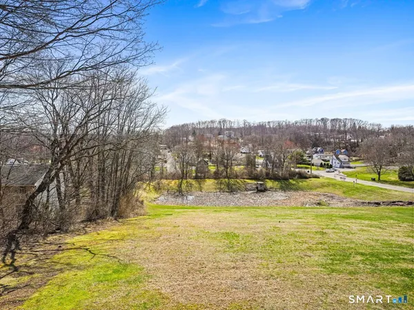 a view of a swimming pool with an ocean view