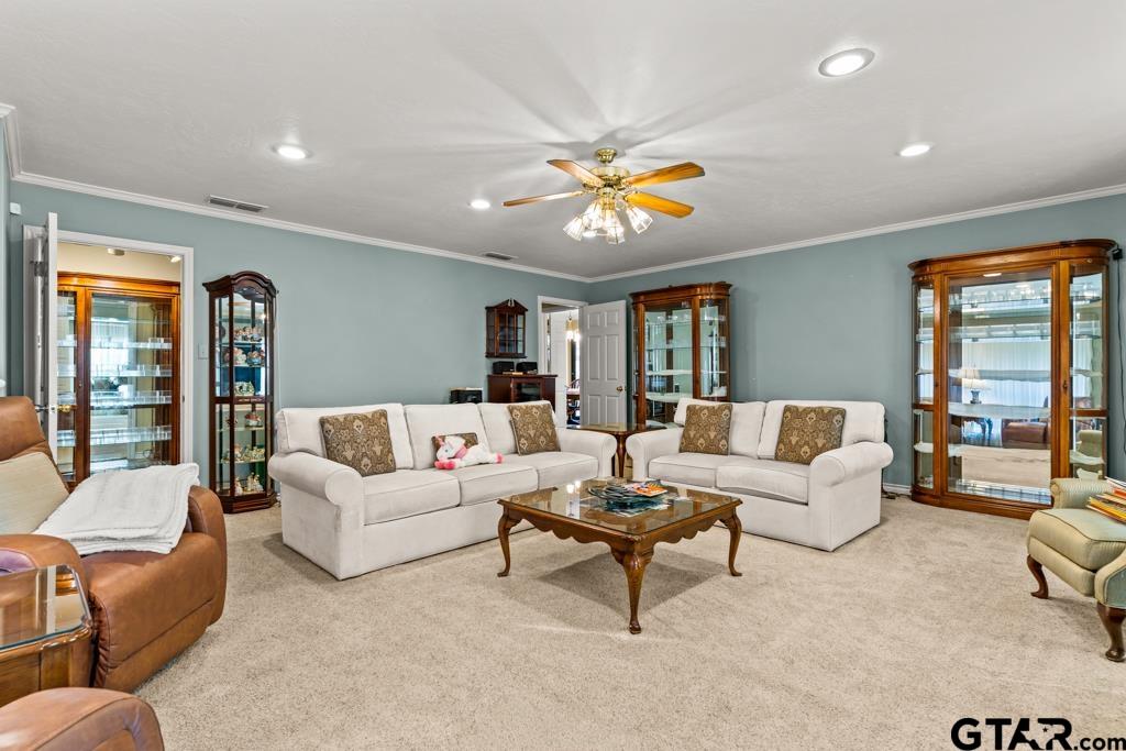106 Cheyenne Street Gilmer, TX 75644 - Photo 24 of 48 a living room with furniture and a large window