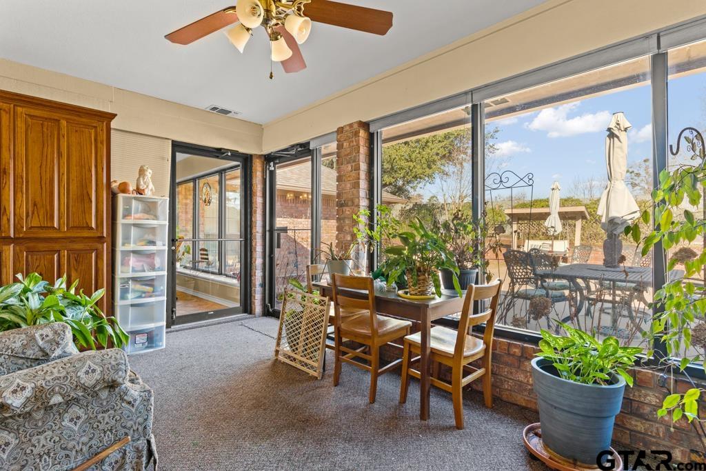 106 Cheyenne Street Gilmer, TX 75644 - Photo 32 of 48 a view of a dining room with furniture window and outside view