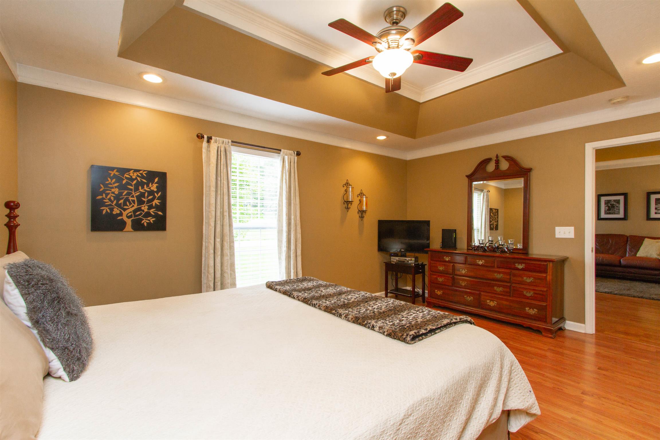 142 Switchboard Road Portland, TN 37148 - Photo 7 of 29 a bedroom with a bed and wooden floor
