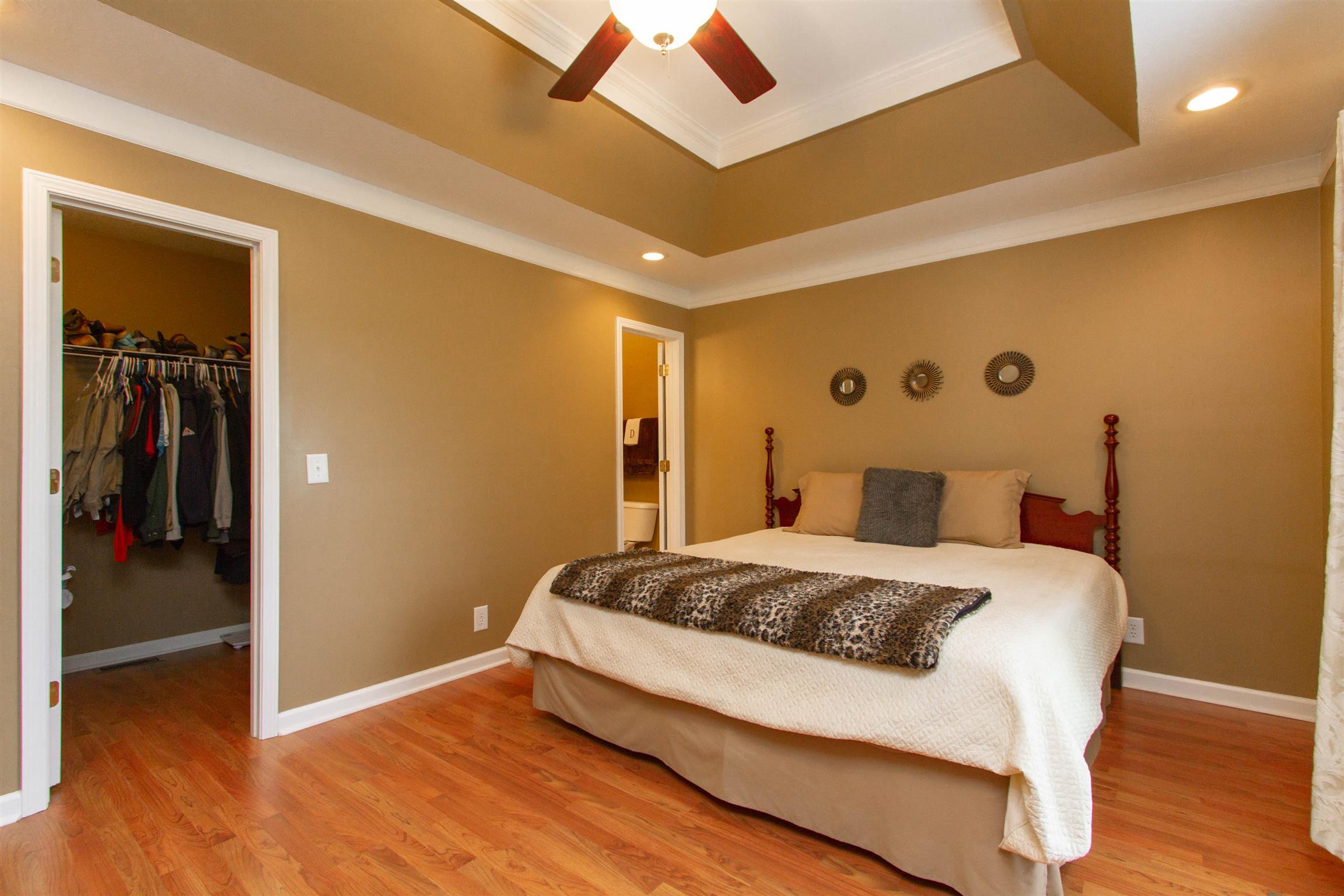 142 Switchboard Road Portland, TN 37148 - Photo 8 of 29 a bedroom with a bed and wooden floor