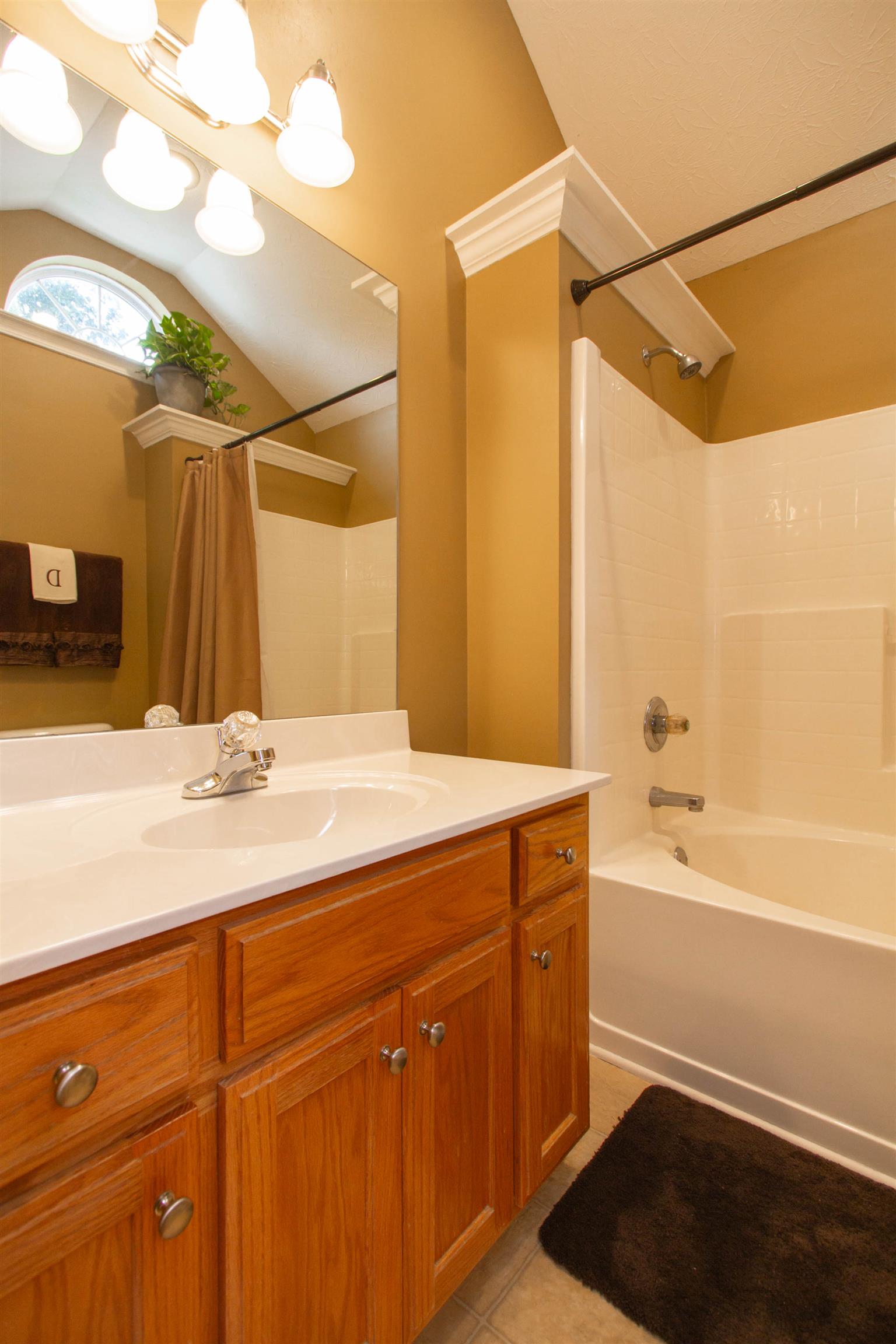 142 Switchboard Road Portland, TN 37148 - Photo 9 of 29 a bathroom with a sink and a bathtub