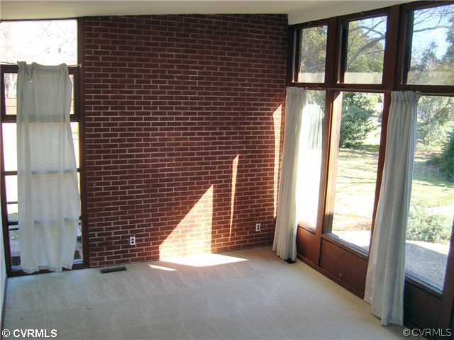 3905 Brook Road Richmond, VA 23227 - Photo 2 of 12 a view of an empty room with a window
