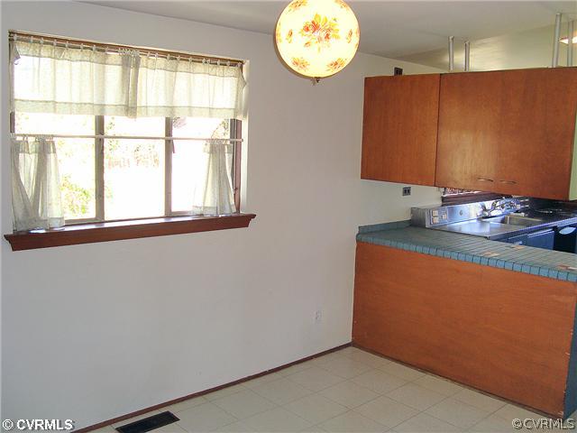 3905 Brook Road Richmond, VA 23227 - Photo 4 of 12 a room with a window