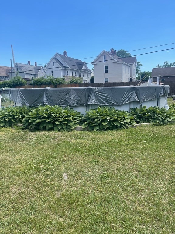59 Ashley Street Springfield, MA 01105 - Photo 13 of 13 a view of a yard with an outdoor space