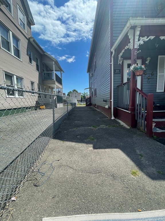 59 Ashley Street Springfield, MA 01105 - Photo 2 of 13 a view of a backyard with sitting area