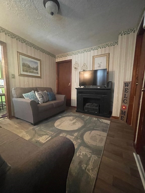 59 Ashley Street Springfield, MA 01105 - Photo 10 of 13 a living room with furniture and a flat screen tv