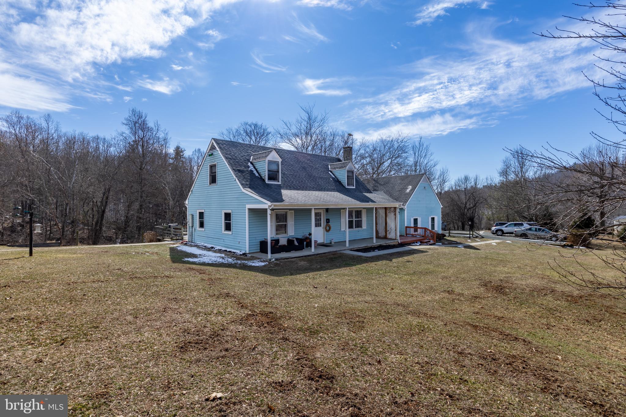 165 Brokenback Mountain Road Free Union, VA 22940 - Photo 11 of 55 a view of a house with a big yard