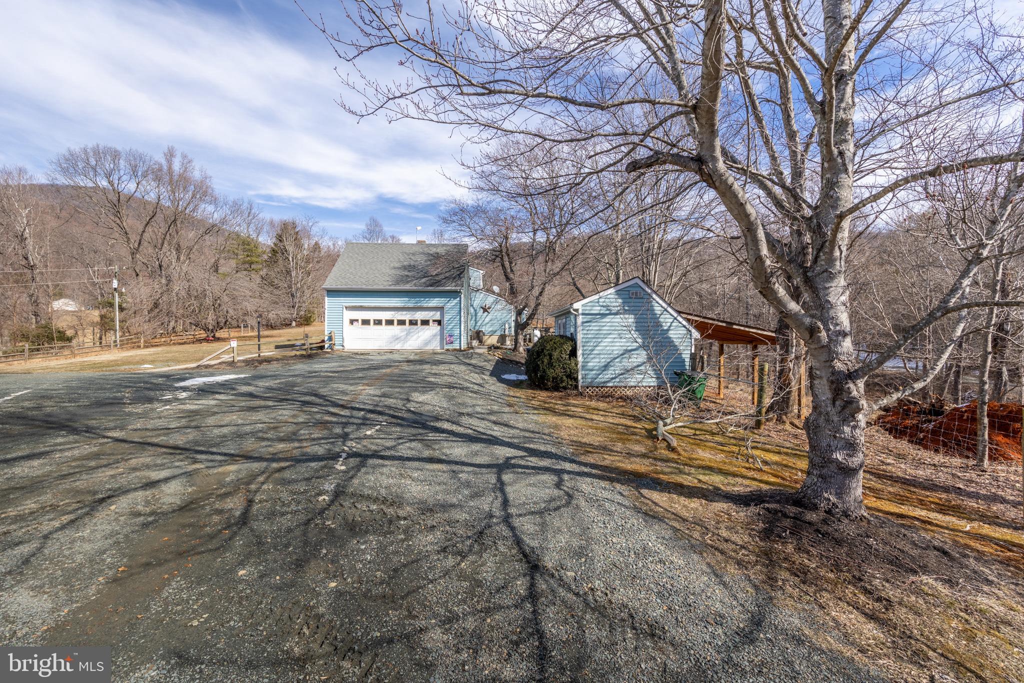 165 Brokenback Mountain Road Free Union, VA 22940 - Photo 3 of 55 a view of street with large trees