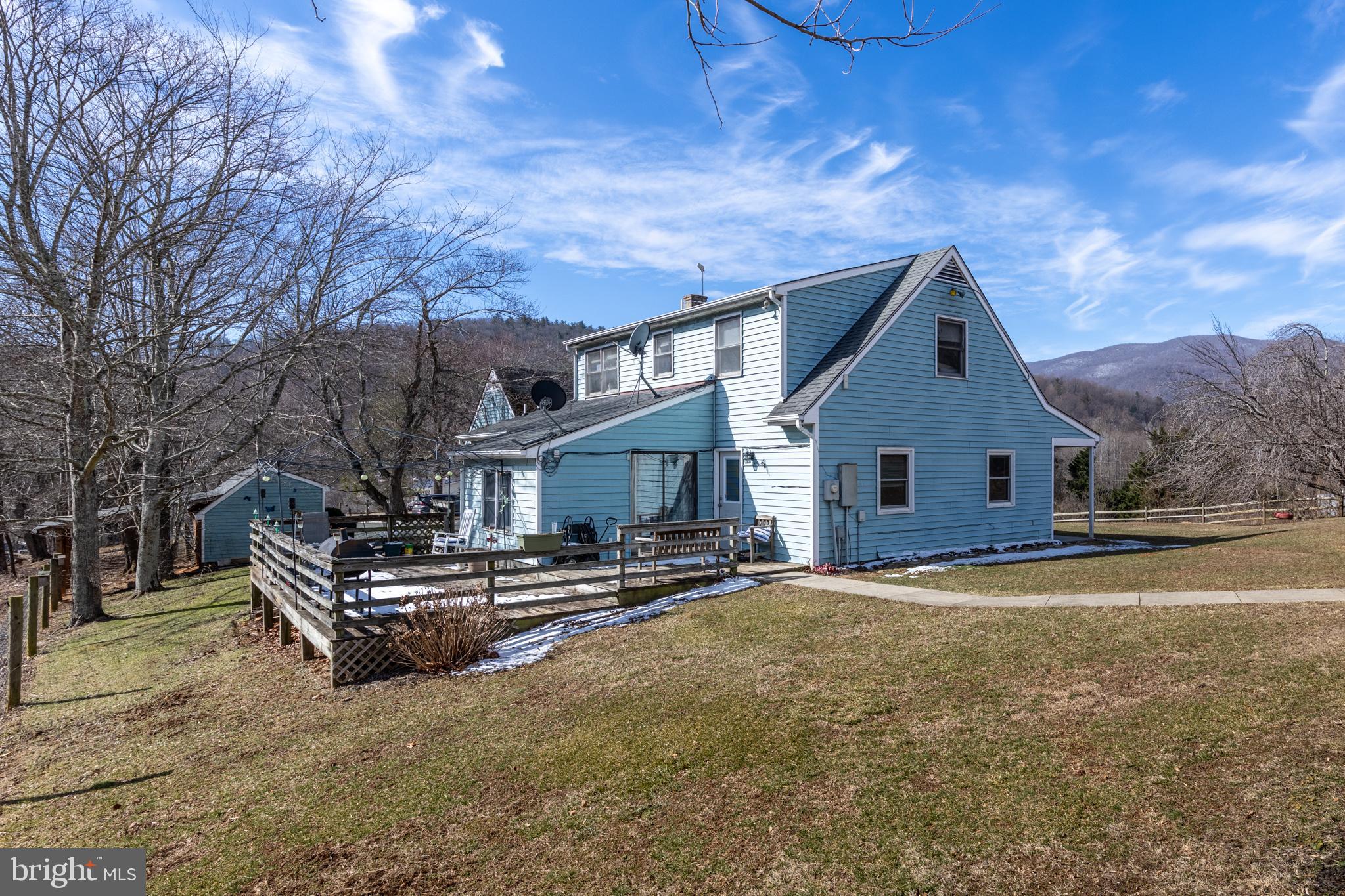 165 Brokenback Mountain Road Free Union, VA 22940 - Photo 9 of 55 a view of a house with a yard