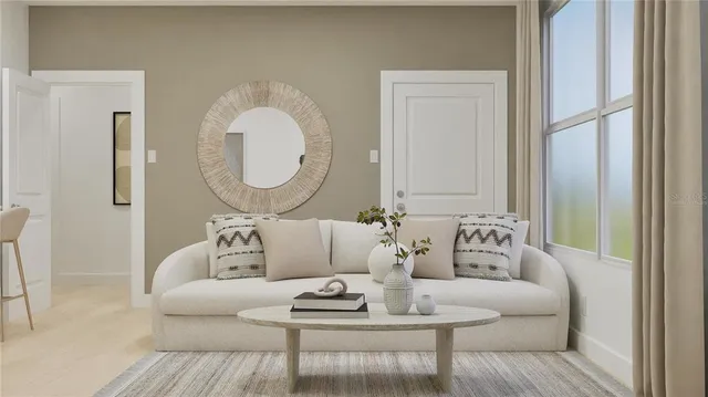 a bedroom with a bed a mirror and a potted plant