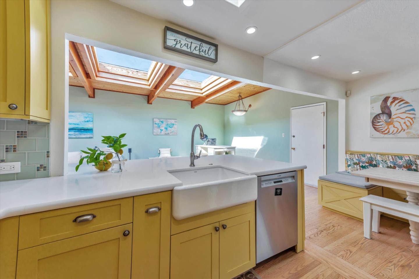 316 Greenway Drive Pacifica, CA 94044 - Photo 14 of 43 a kitchen with stainless steel appliances granite countertop a sink and a cabinets