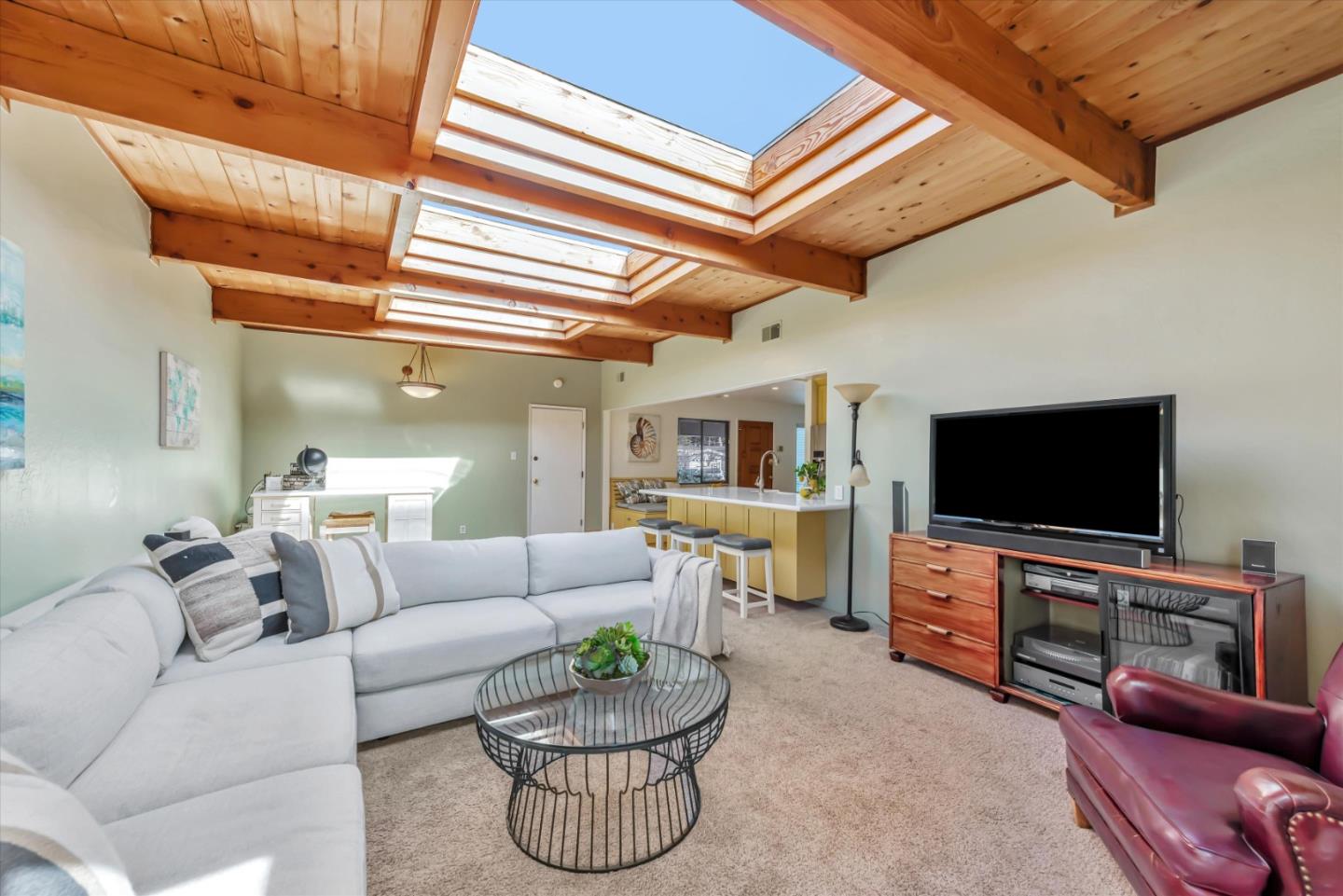 316 Greenway Drive Pacifica, CA 94044 - Photo 20 of 43 a living room with furniture and a flat screen tv