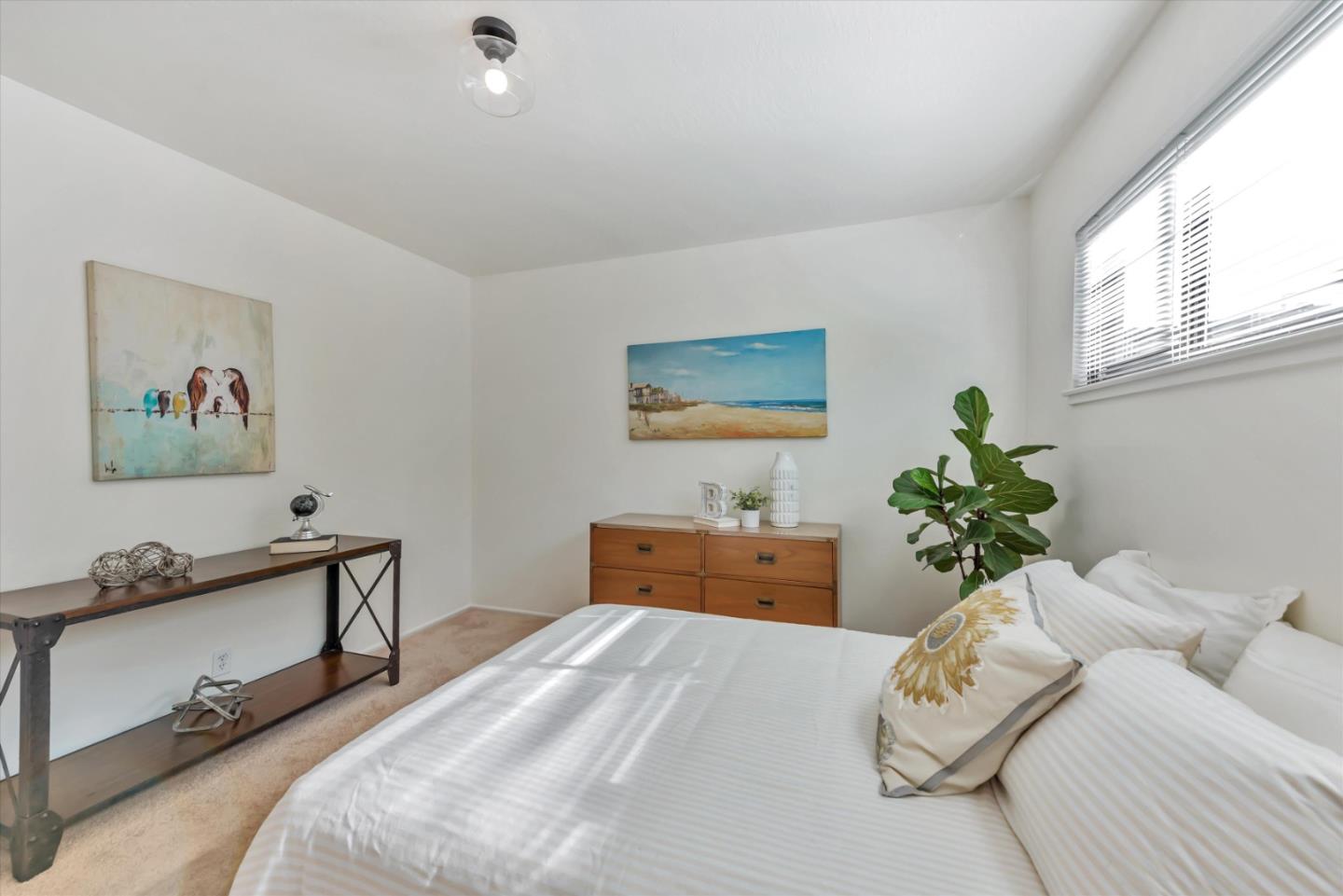 316 Greenway Drive Pacifica, CA 94044 - Photo 26 of 43 a bedroom with a bed and a dresser