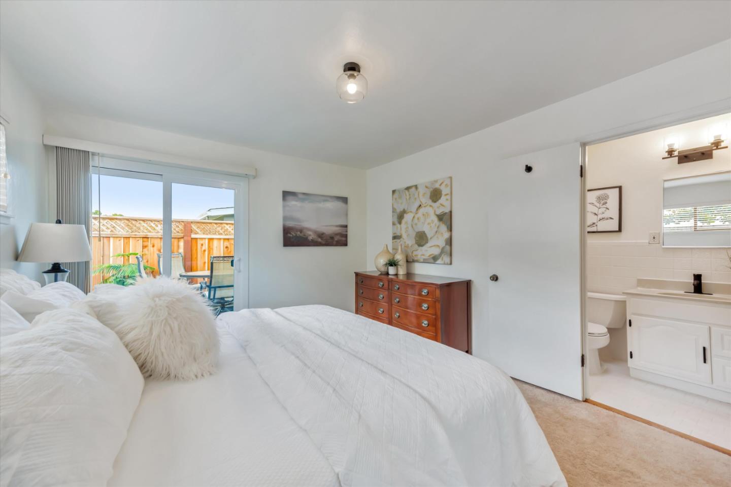 316 Greenway Drive Pacifica, CA 94044 - Photo 28 of 43 a bedroom with a large bed and a window