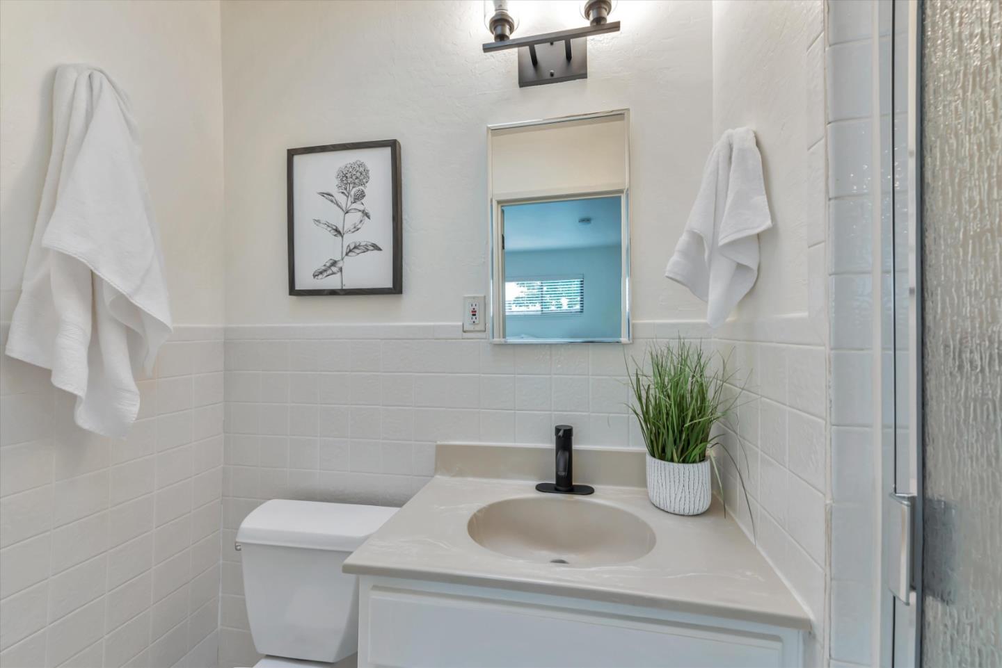 316 Greenway Drive Pacifica, CA 94044 - Photo 30 of 43 a bathroom with a toilet and a sink