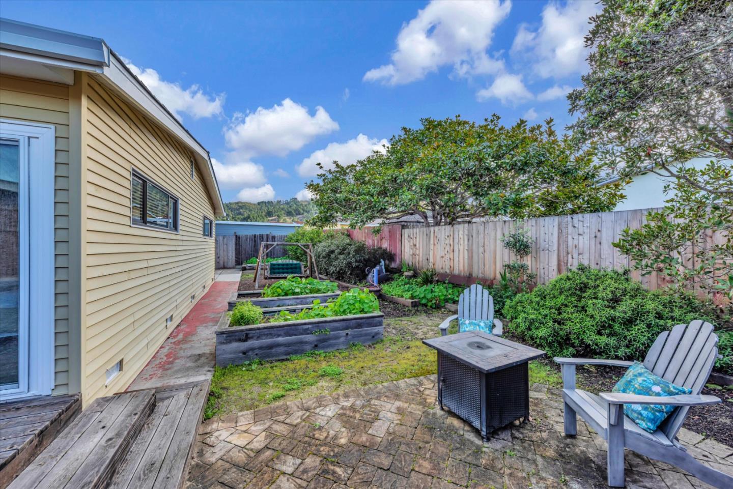 316 Greenway Drive Pacifica, CA 94044 - Photo 32 of 43 a view of house with backyard and garden