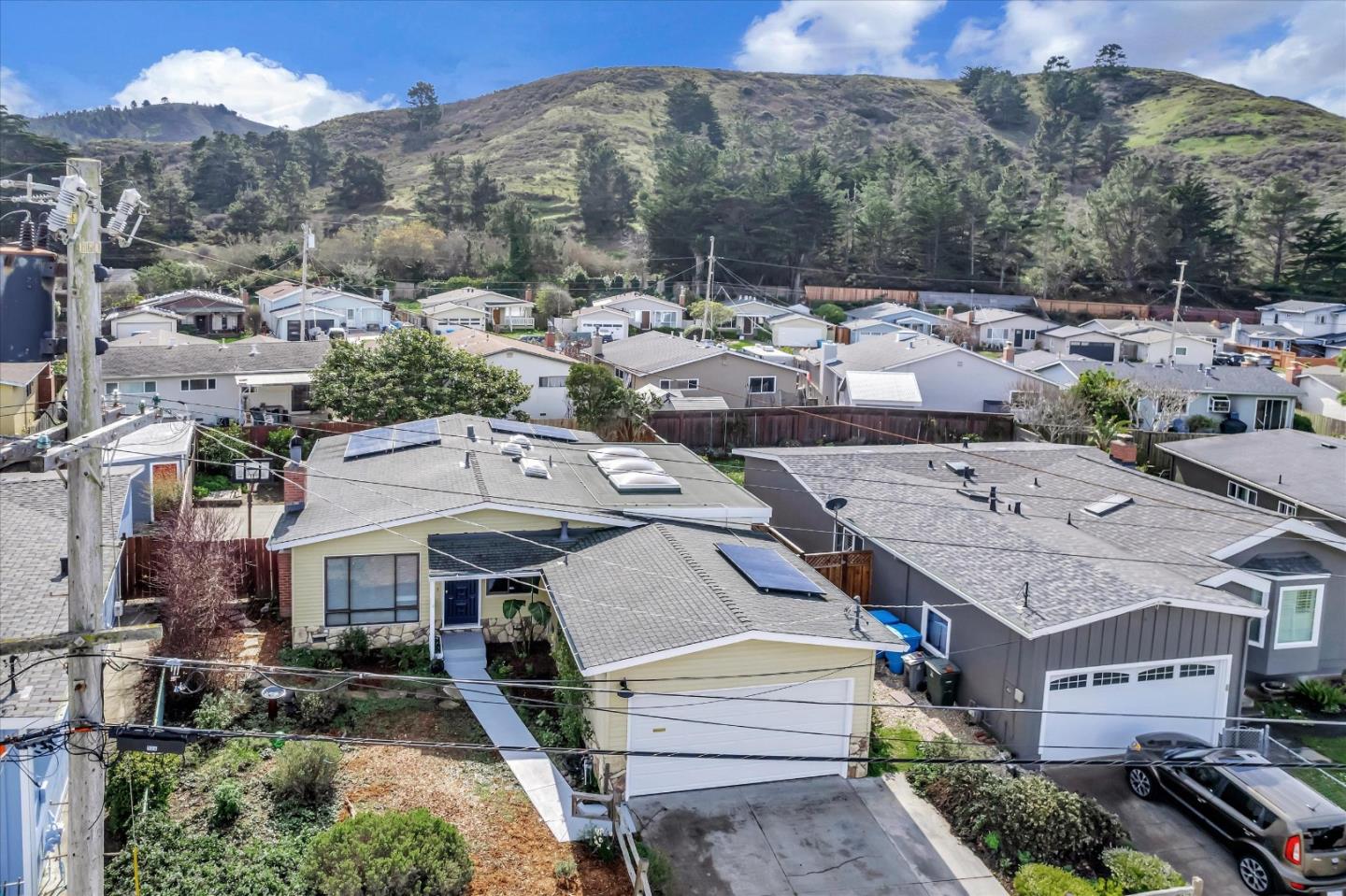 316 Greenway Drive Pacifica, CA 94044 - Photo 38 of 43 an aerial view of a house with a mountain in the background