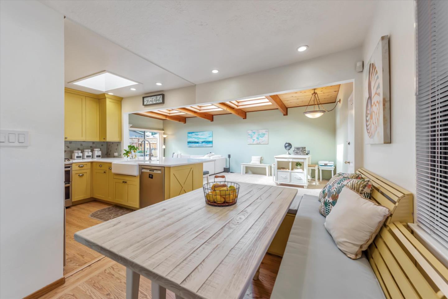 316 Greenway Drive Pacifica, CA 94044 - Photo 10 of 43 a kitchen with a sink dishwasher and wooden cabinets