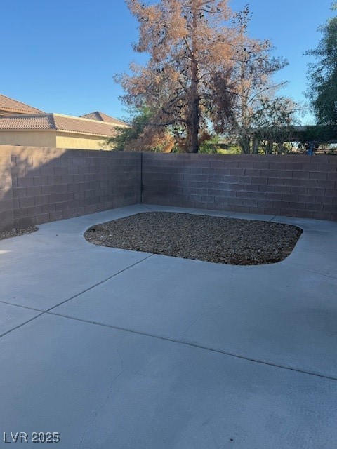 5474 Jacobs Field Street Las Vegas, NV 89148 - Photo 9 of 13 View of yard featuring a fenced backyard