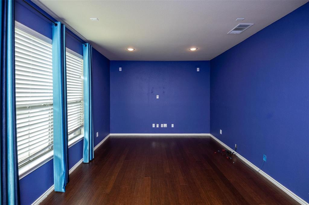 7607 Yearling Way Arlington, TX 76002 - Photo 19 of 25 a view of empty room with wooden floor