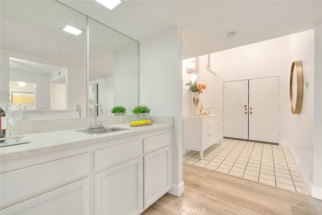 1540 Corte Hacienda Upland, CA 91786 - Photo 14 of 66 a bathroom with a sink and a mirror