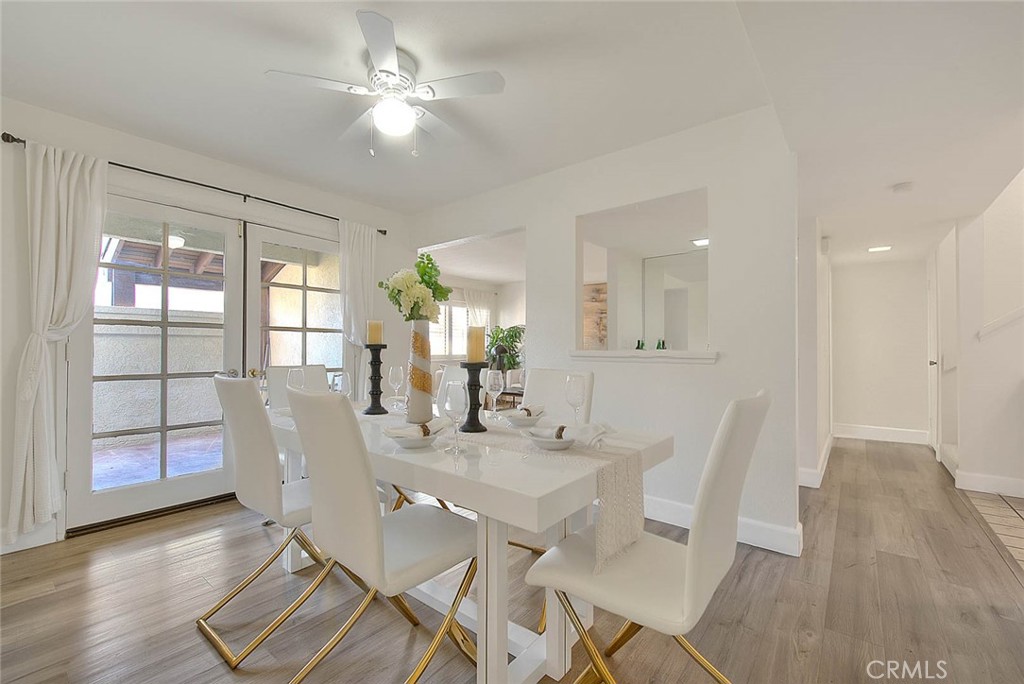 1540 Corte Hacienda Upland, CA 91786 - Photo 17 of 66 a view of a dining room with furniture and wooden floor