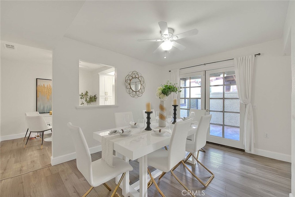 1540 Corte Hacienda Upland, CA 91786 - Photo 20 of 66 a view of a dining room with furniture and wooden floor