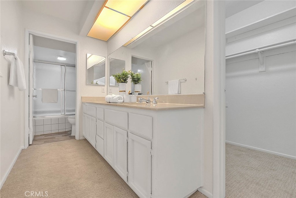 1540 Corte Hacienda Upland, CA 91786 - Photo 46 of 66 a bathroom with a double vanity sink and a mirror