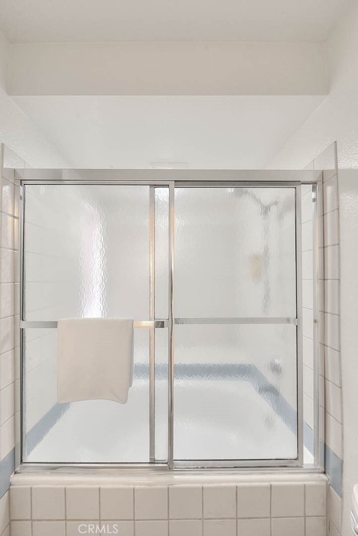 1540 Corte Hacienda Upland, CA 91786 - Photo 48 of 66 a bathroom with a glass shower door