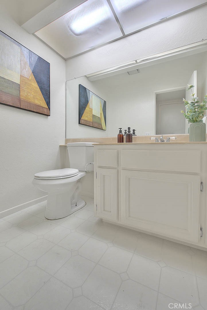 1540 Corte Hacienda Upland, CA 91786 - Photo 51 of 66 a bathroom with a sink toilet and mirror