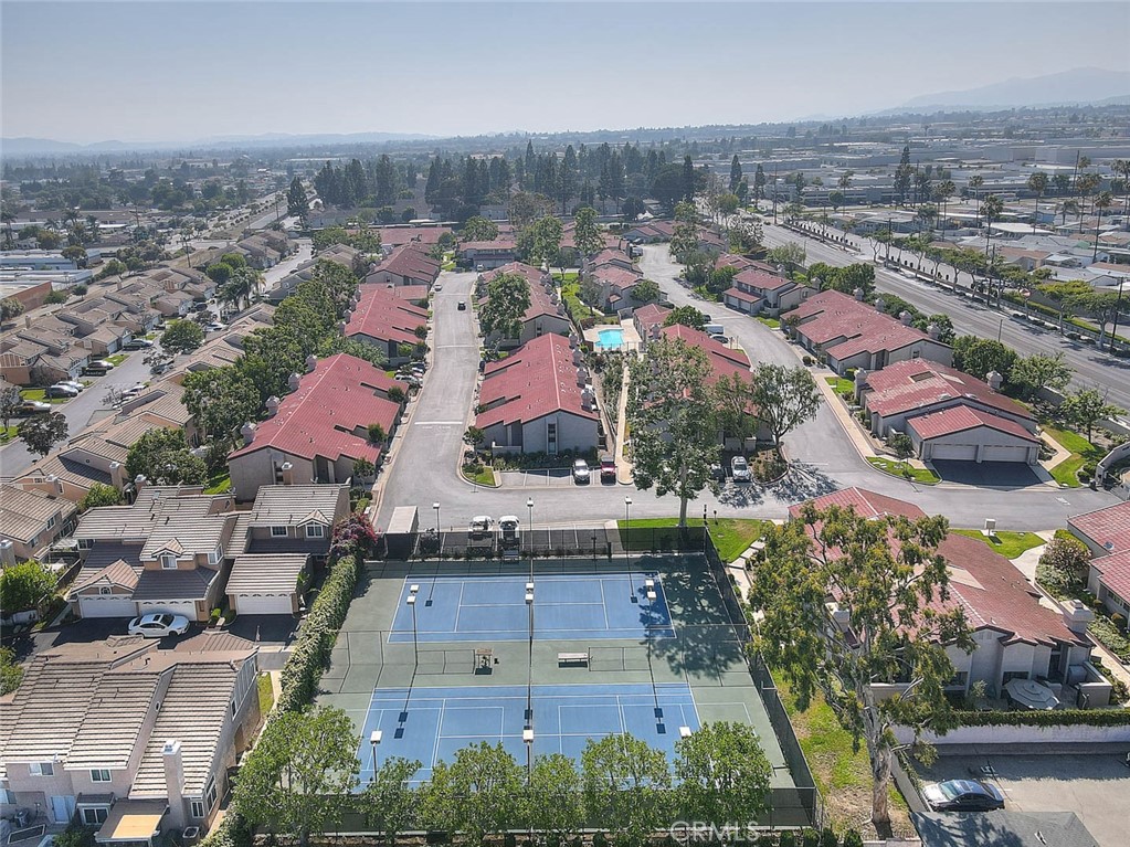 1540 Corte Hacienda Upland, CA 91786 - Photo 65 of 66 an aerial view of residential houses with outdoor space and parking