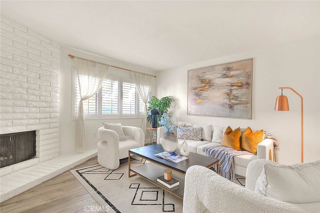 1540 Corte Hacienda Upland, CA 91786 - Photo 8 of 66 a living room with furniture and a fireplace