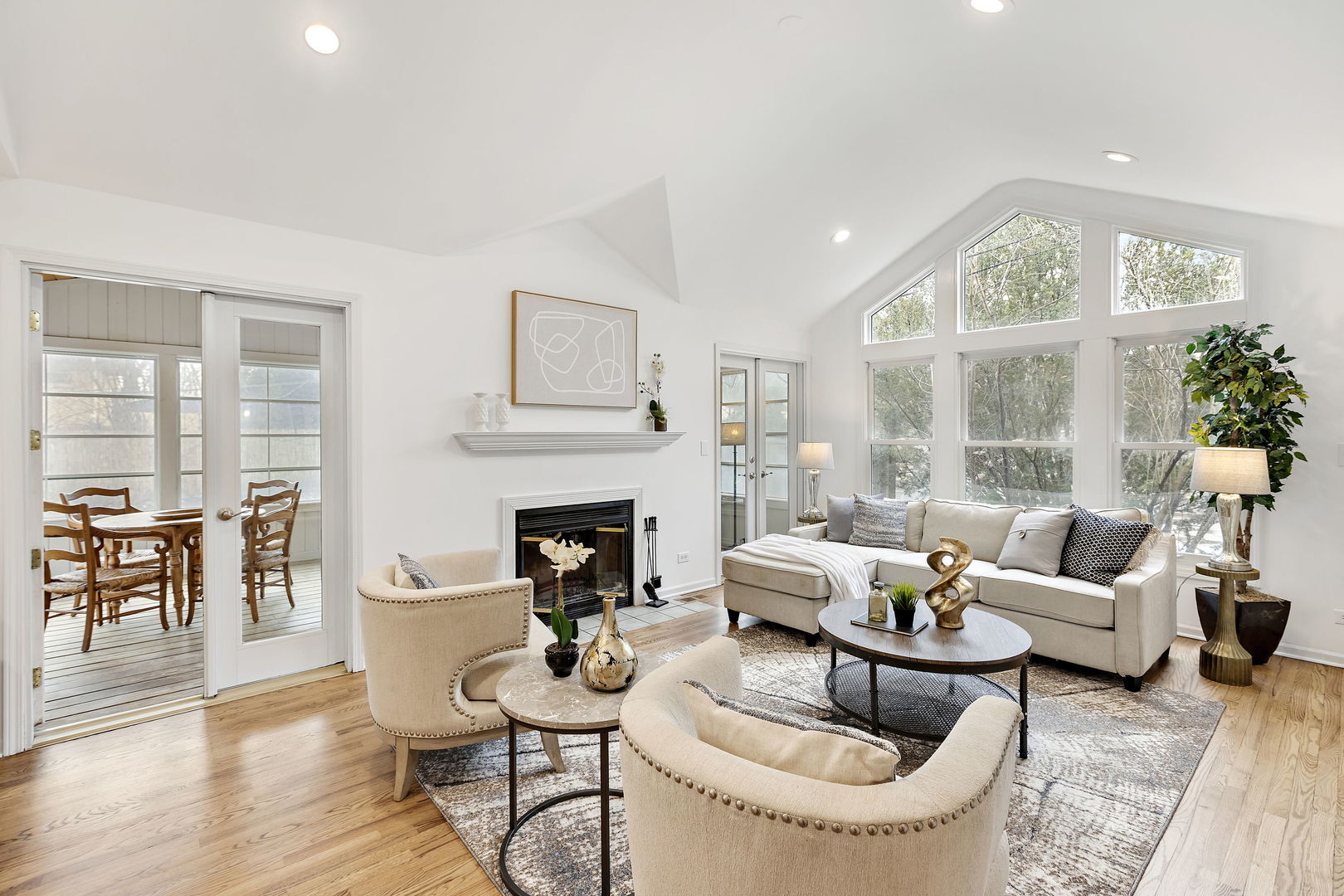 619 Forest Road Glenview, IL 60025 - Photo 8 of 28 a living room with furniture fireplace and a large window