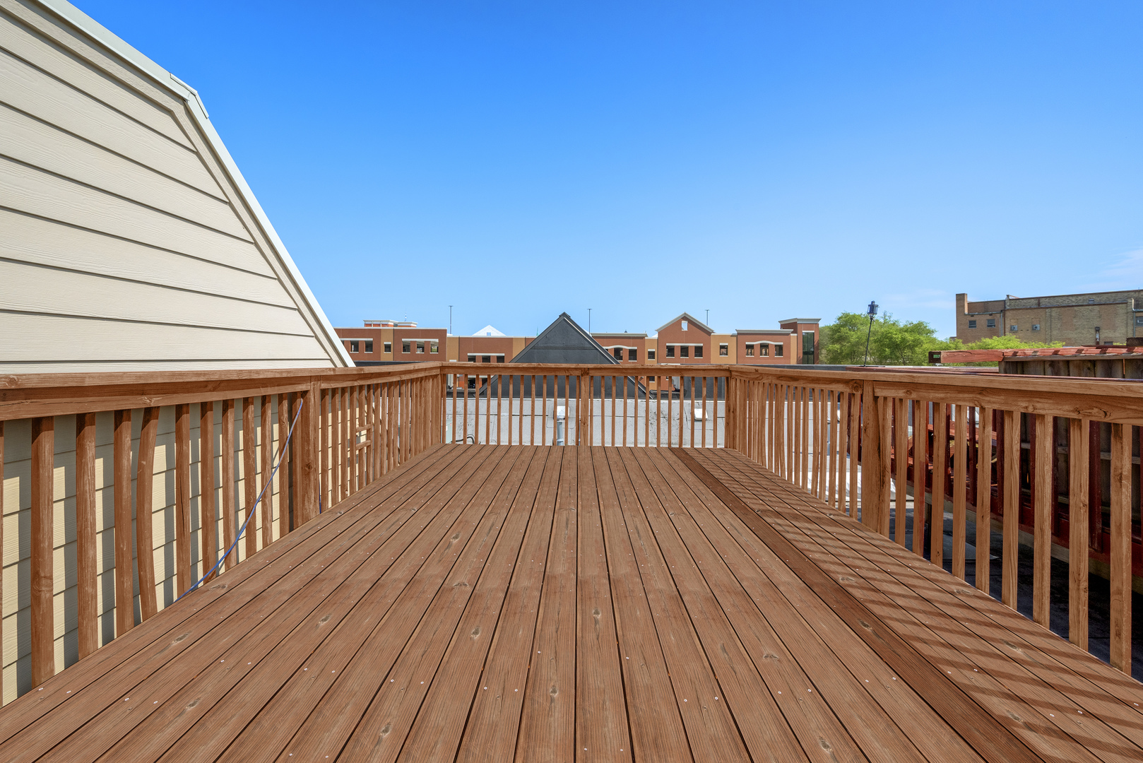 203 Prairie Street Elgin, IL 60120 - Photo 19 of 34 a view of wooden deck with a yard