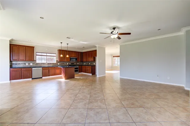a view of a kitchen with a sink and a kitchen view