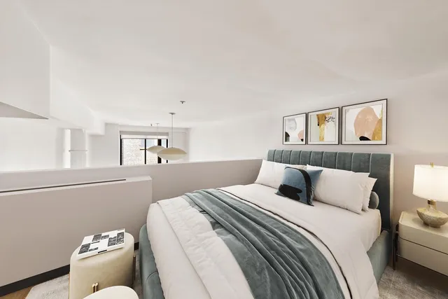 a picture of a book and a bed