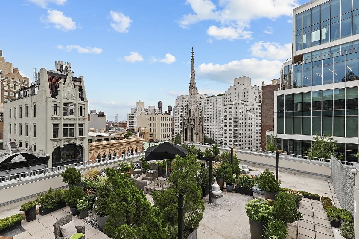 67 East 11th Street, Unit 503 Manhattan, NY 10003 - Photo 8 of 10 a city view with tall buildings